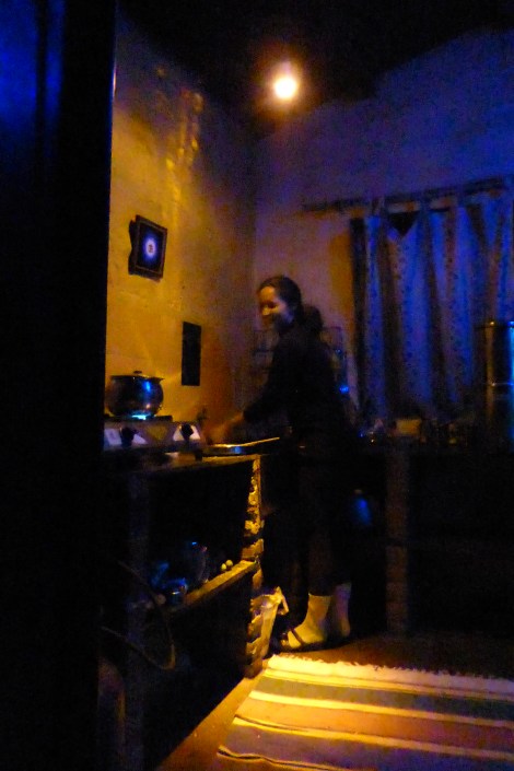 Jane washing up sporting socks and sandals, our new look