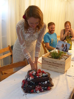 Laura cutting Mums massive Cloud Forest Chocolate Cake 